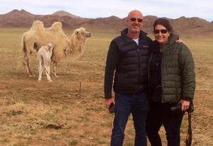 The doctors with a camel in Mongolia with Pediatric Dentist from Fort Lee and Westwood, NJ
