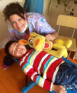 happy patient in Mongolia with Pediatric Dentist from Fort Lee and Westwood, NJ