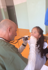 checking teeth in Mongolia with Pediatric Dentist from Fort Lee and Westwood, NJ